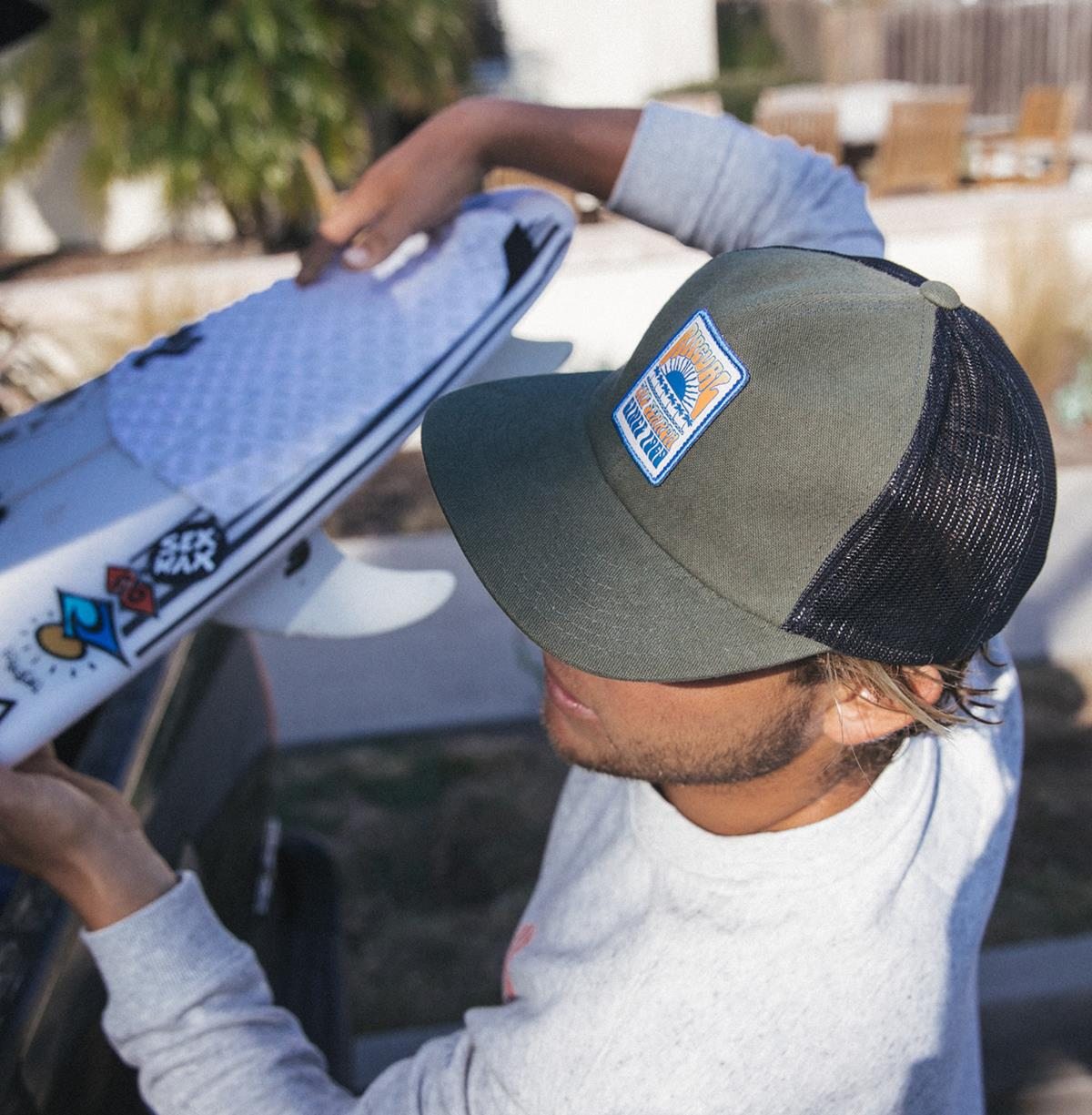 Conner Coffin wearing the Never Stop Trucker Hat