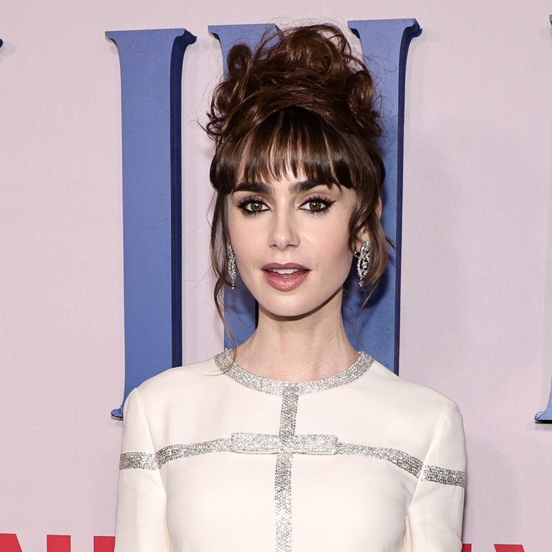 NEW YORK, NEW YORK - DECEMBER 15: Lily Collins attends the Emily In Paris French Consulate Red Carpet at French Consulate on December 15, 2022 in New York City. (Photo by Jamie McCarthy/Getty Images for Netflix)