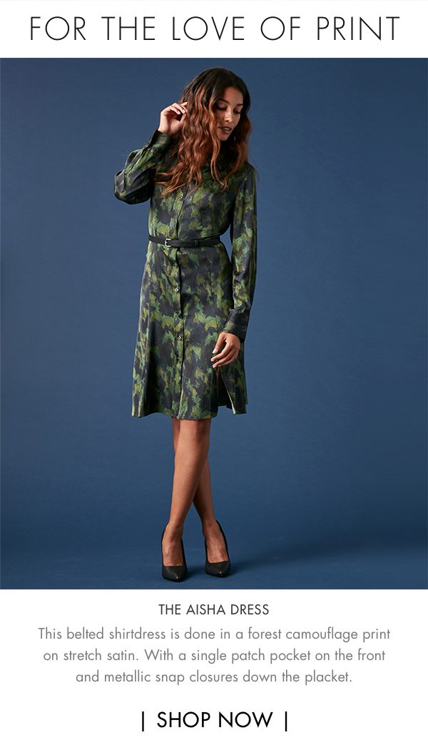 For the love of print - The Aisha Dress - This shirt-dress is done in a forest camouflage print on stretch satin. With a single patch pocket on the front and metallic snap closures down the placket. Wear it belted to emphasize your waist.