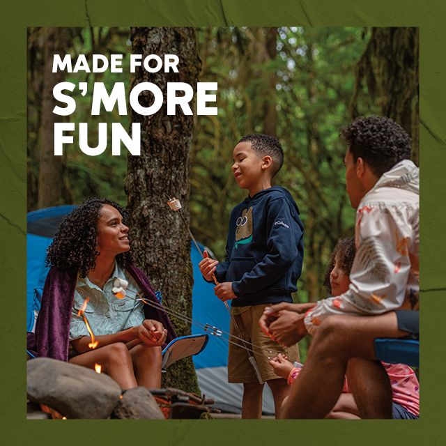 Made for Smore Fun. Family roasting smores in the forest.
