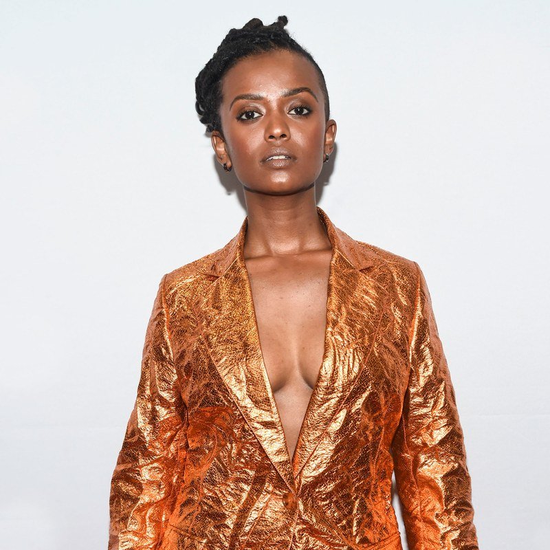 Kelela in a copper suit