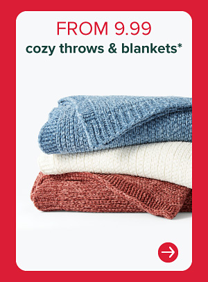 A stack of folded blankets. From 9.99 cozy throws and blankets.