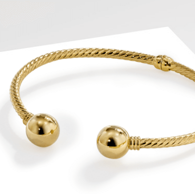 Image showcasing a beautiful Gold Bracelet, on a White background.