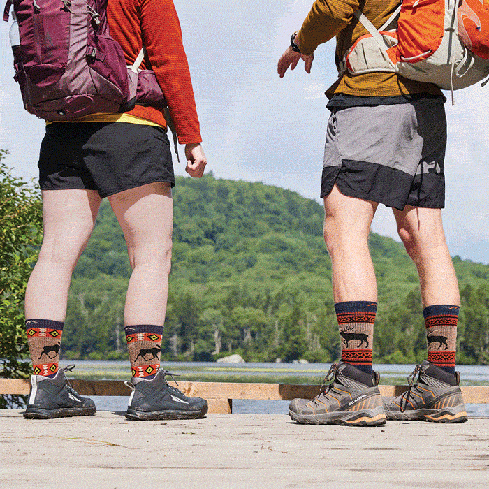 Shop the new Vanna Grizzle - hikers wearing men's Van Grizzle and women's Vanna Grizzle socks