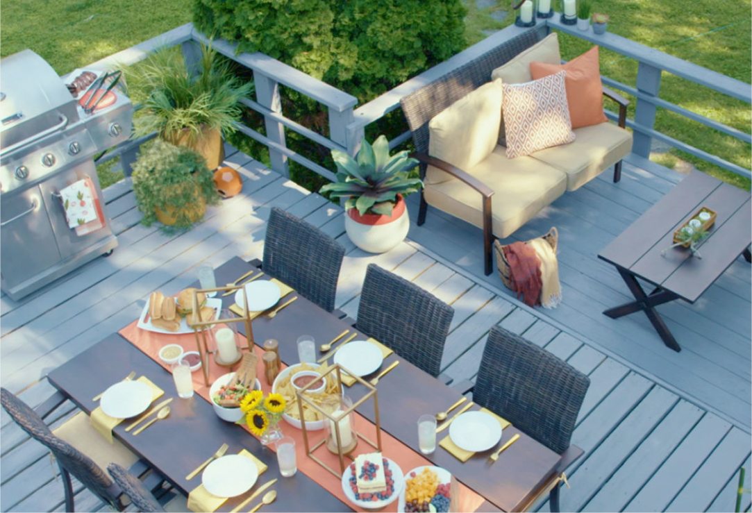 Image of a painted deck set up for entertaining