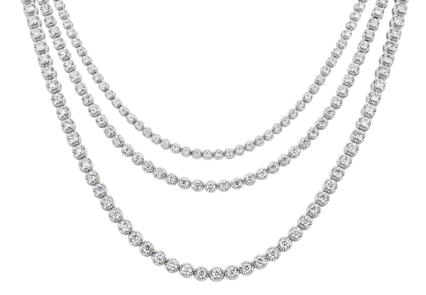 How to layer diamond jewelry.