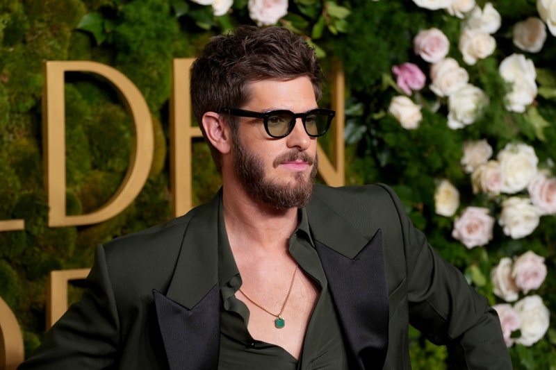 Image may contain: Andrew Garfield, Accessories, Glasses, Jewelry, Necklace, Adult, Person, Pendant, Face, Head, and Blazer