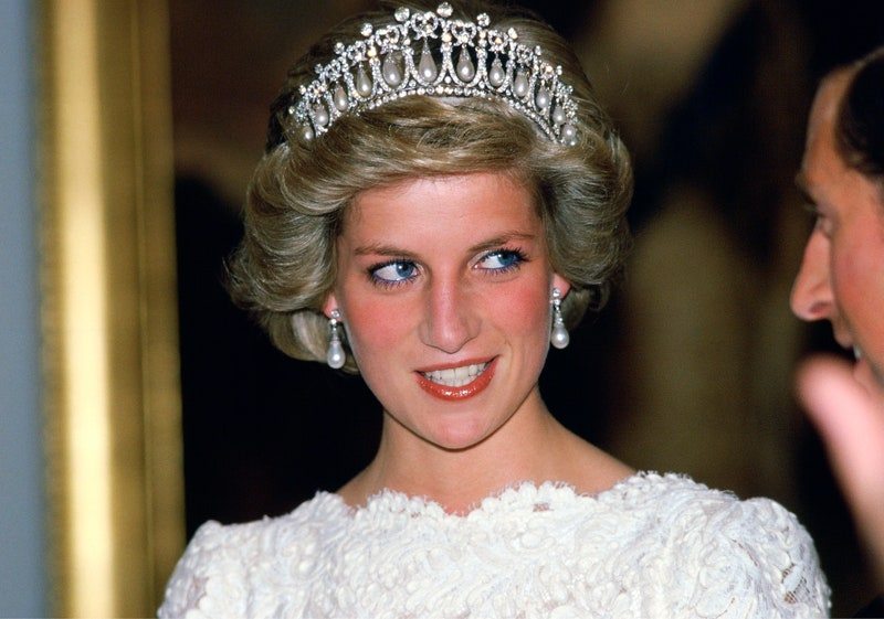 Diana, Princess Of Wales, Talking To Her Husband, During A Visit To The British Embassy. The Princess Is Wearing A Taffeta And Lace Gown With A Scalloped Neckline Designed By Murray Arbeid With Queen Mary's Diamond And Pearl Tiara, A Present From The Queen.