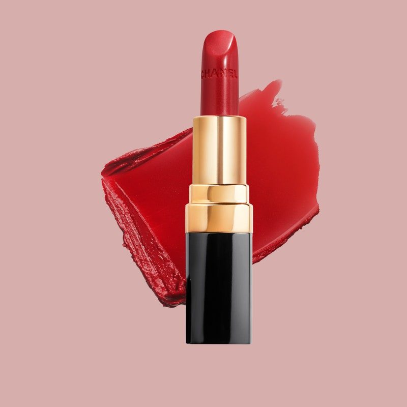 Chanel Rouge Coco Ultra Hydrating Lip Color in shade 434 Mademoiselle with red lipstick swatch on pale pink background