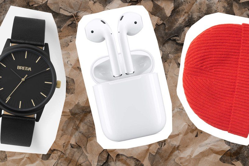 A watch, some airpods, and a beanie