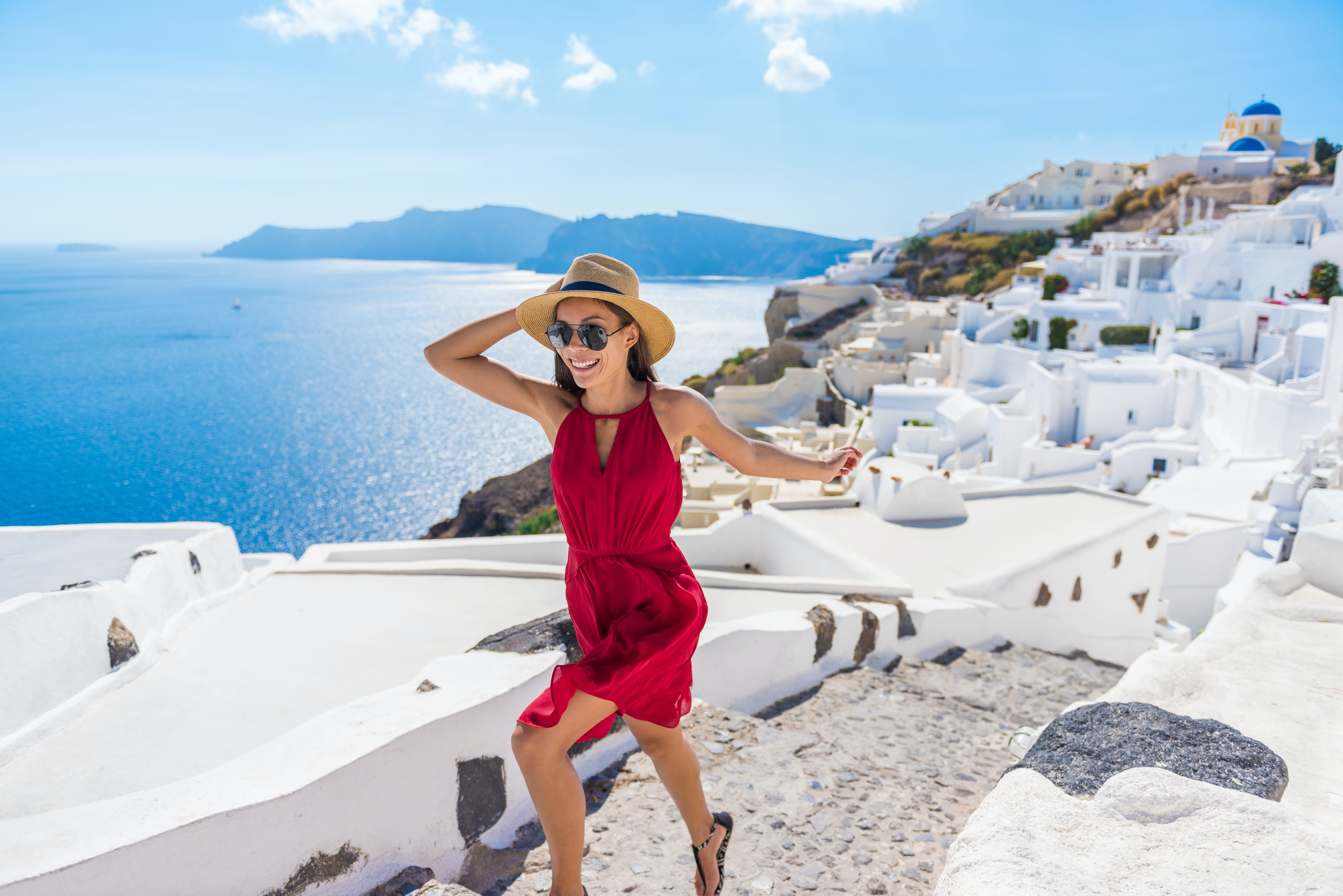 Woman Running Stairs Santorini, Greek Islands, Greece, Europe