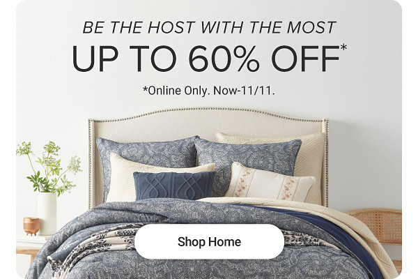 Be the host with the most. Up to 60% off. Now to November 7th. Shop home. A bed with blue patterned bedding.