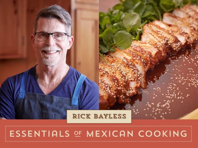 Rick Bayless smiling at camera. Essentials of Mexican Cooking.