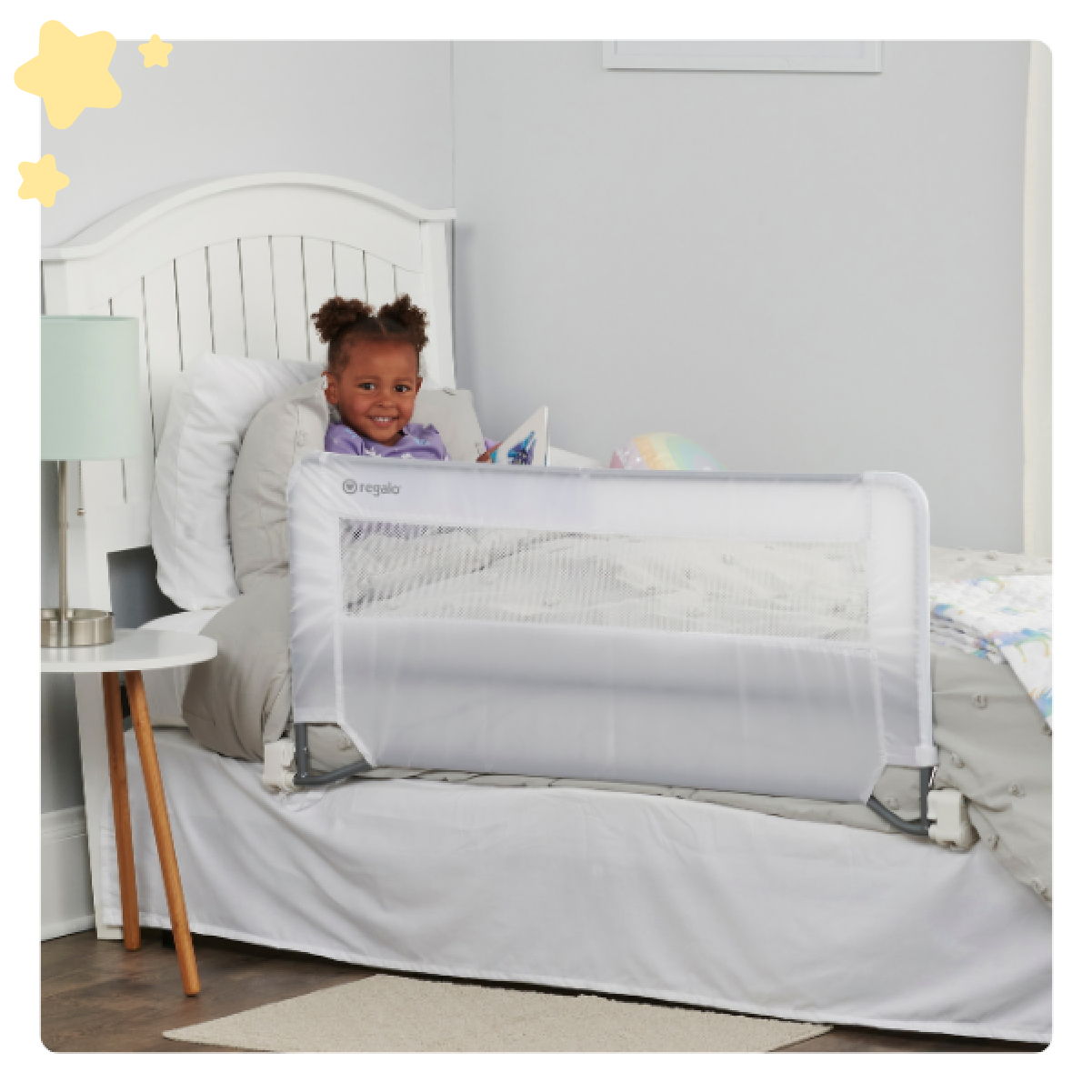 Toddler Sitting Up in Bed with Swing Down Bed Rail