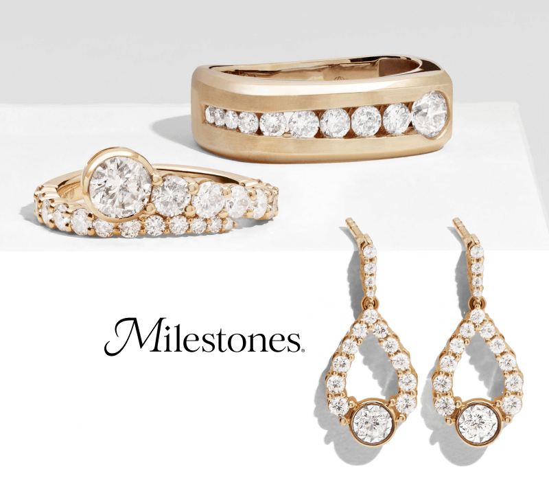 Display of Milestones gold diamond rings and earrings