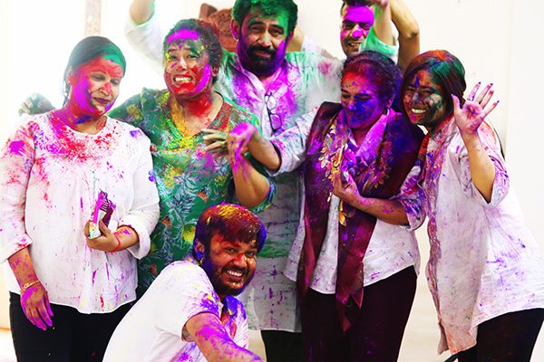 NOVICA packing team in India celebrating Holi