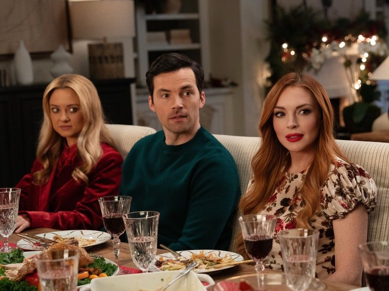 Image may contain: Lindsay Lohan, Ian Harding, Euphemia Chalmers Gray, Cup, Adult, Person, Indoors, Restaurant, and Furniture