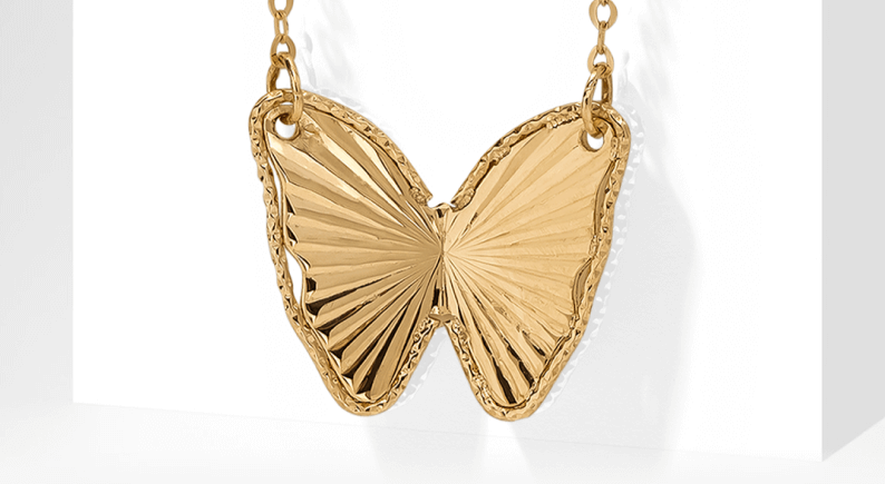 Gold butterfly pendant