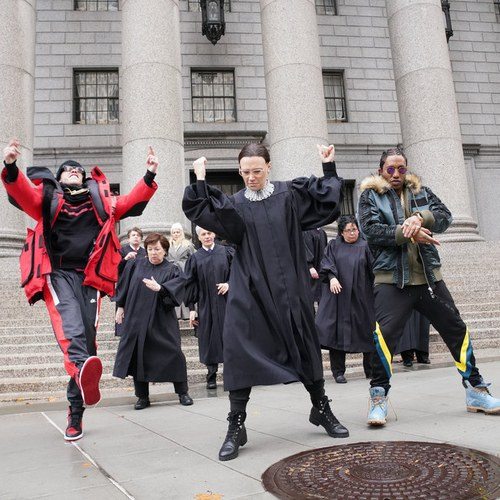 Kate McKinnon as Ruth Bader Ginsburg throws down some rhymes (with others backing her) during an SNL sketch.