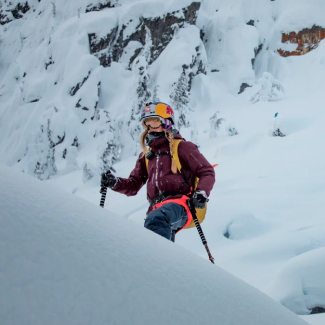 Read Michelle's blog - MIchelle Parker climbs up a snowy slope on her skis