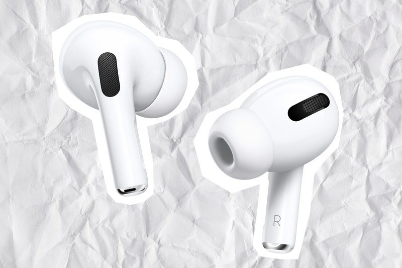 A pair of the new airpods on a crinkled paper background