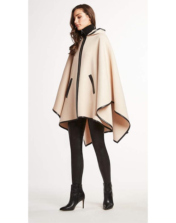 The Kristy Cape - Sophisticated layering starts with luxe outerwear. We love the silhouette of this double-faced wool cape. With contrasting piping and front-slit pockets.