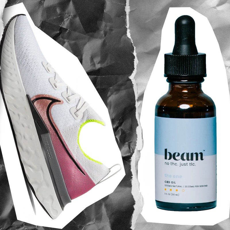 A set of dumbbells, a sneaker, and a vial of CBD oil
