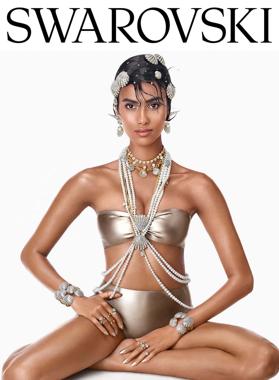 Imaan Hammam in Idyllia shell jewelry