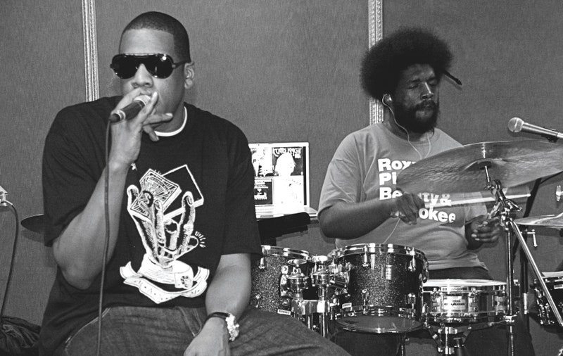 Image may contain: Jay-Z, Questlove, Electrical Device, Microphone, Adult, Person, Accessories, Glasses, Clothing, and Glove