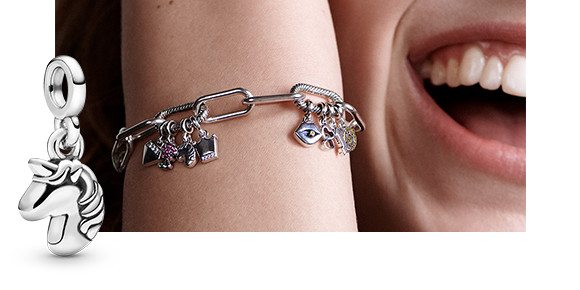 Learn what Millie Bobby Brown's favorite micro dangle charms are and discover the story behind them