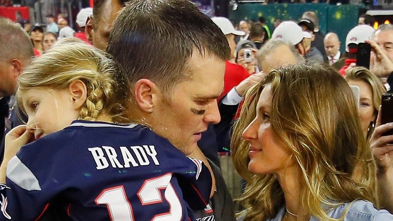 HOUSTON, TX - FEBRUARY 05: Tom Brady #12 of the New England Patriots celebrates with wife Gisele Bundchen and daughter Vivian Brady after defeating the Atlanta Falcons during Super Bowl 51 at NRG Stadium on February 5, 2017 in Houston, Texas. The Patriots defeated the Falcons 34-28. (Photo by Kevin C. Cox/Getty Images)