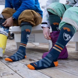 Shop Socks that support High Fives athletes - a skier and snowboarder wearing High Fives snow socks