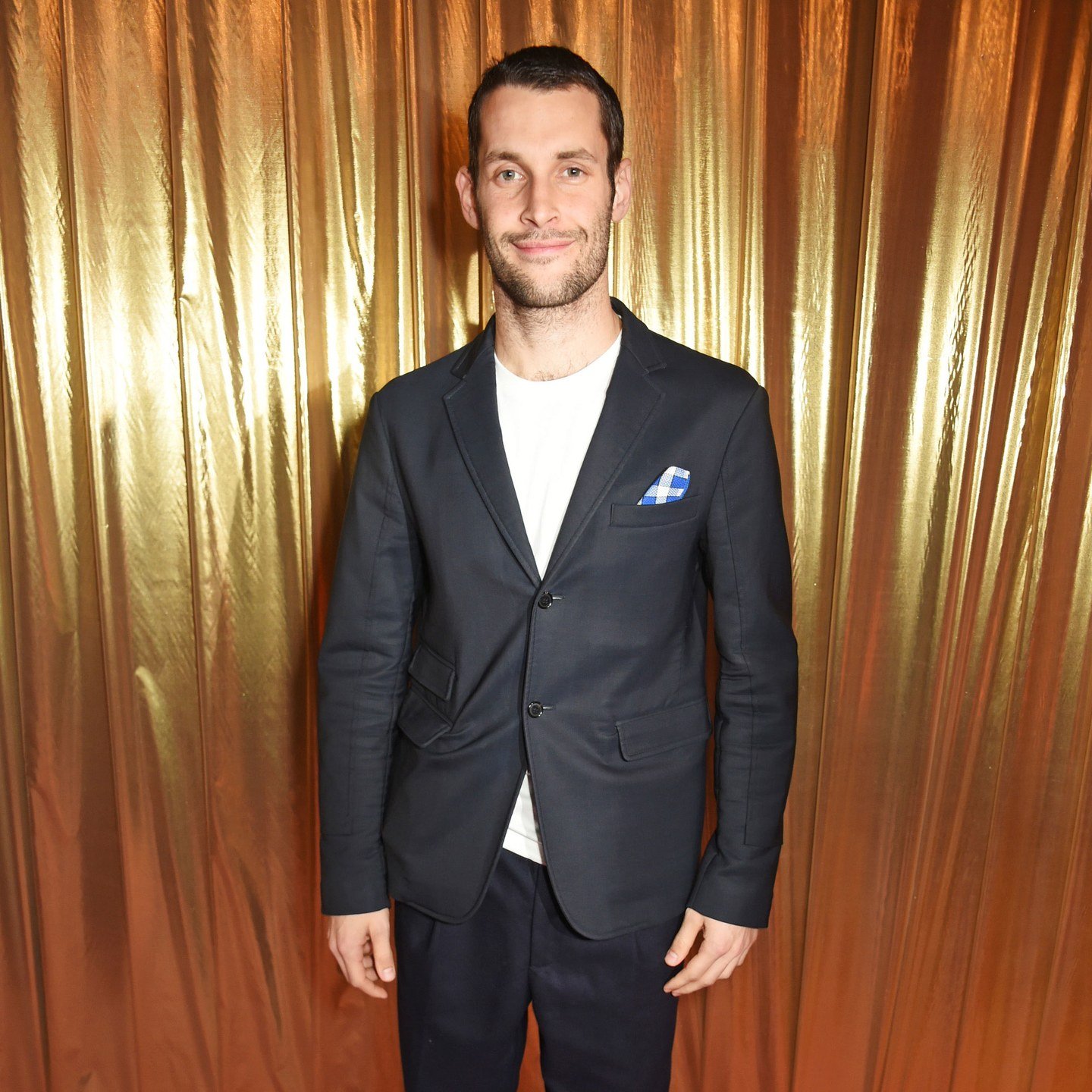 A photo of Simon Porte Jacquemus in a suit.