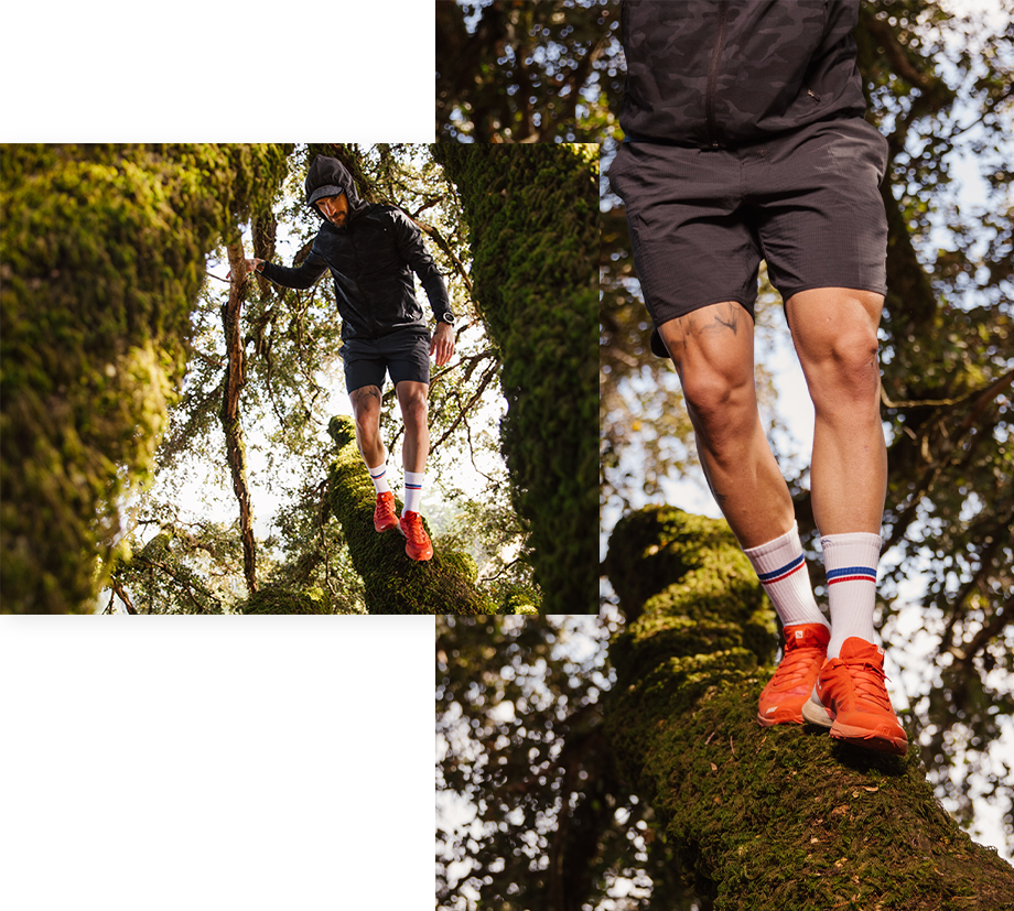 A man swiftly descends a felled tree in a fresh pair of athletic socks