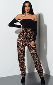 Give U A Taste Leopard Pants are a thin, lightweight, paper bag style pant complete with a relaxed fit, high rise, pleated waistband, matching tie belt, concealed back zipper and an allover fierce leopard print pattern.