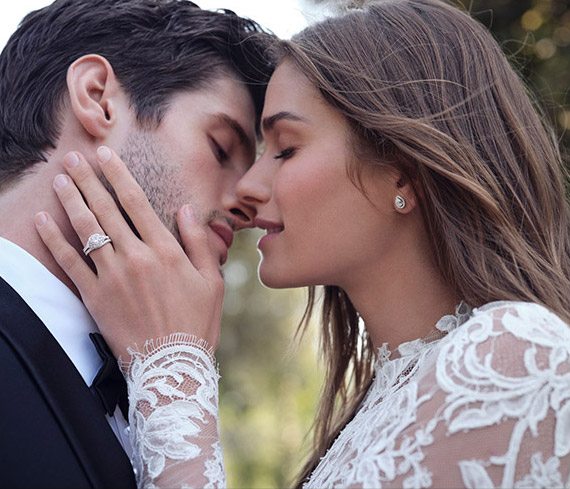 Newly Engaged Couple Kissing