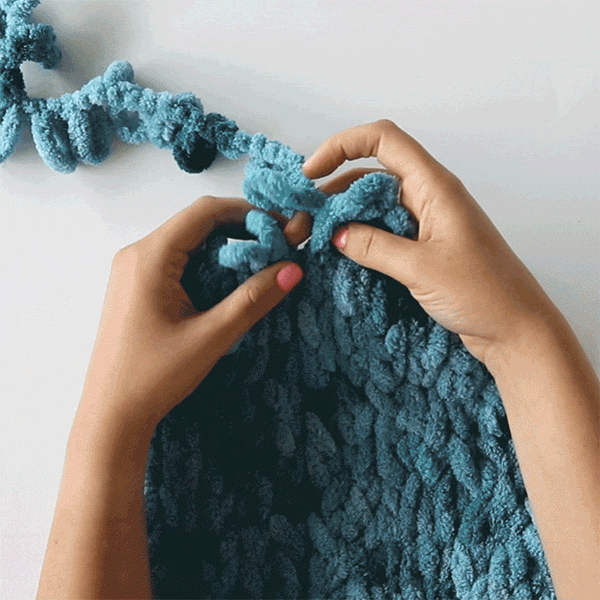 GET IN THE LOOP. Anyone can knit without needles in one easy step.