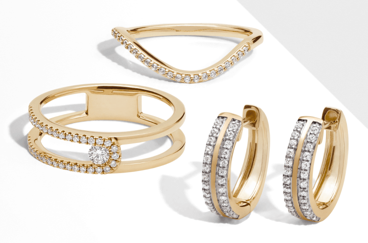 Stunning display of gold diamonds rings and hoop earrings