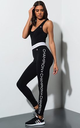 The Champion High Waist Repeating Logo Tights are made from a super comfy stretch fabrication, with a high rise, sporty contrast waist band, Champion C logo on the front of the left leg, and a ‘CHAMPION’ logo that repeats on each leg all the way down.