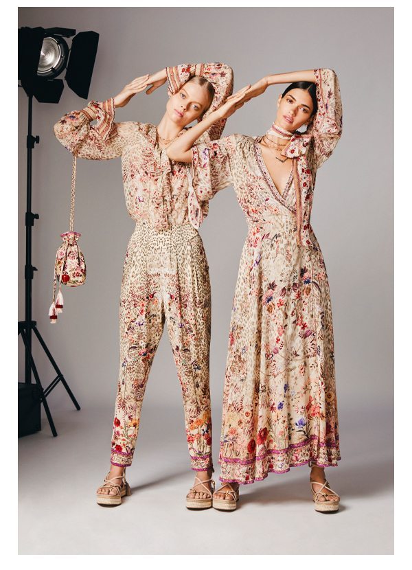 Models wearing drifting dreamer blouse, harems and wrap dress