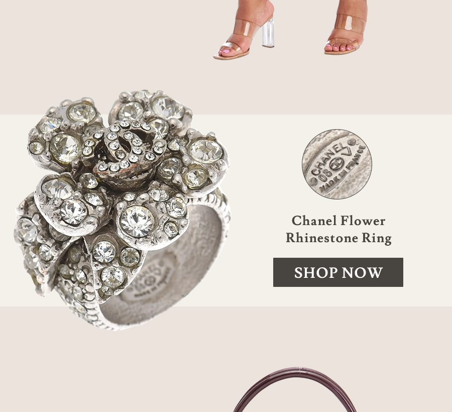 https://steinmart.com/products/chanel-flower-rhinestone-ring?variant=40224275529925&vpid=6783411093701
