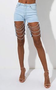The Catch and Release Chain Denim Shorts are a remixed take on the classic short, complete with a bermuda length, distressed detailing, stretch denim base, front and back pockets and small chain links detailing the front of the shorts.