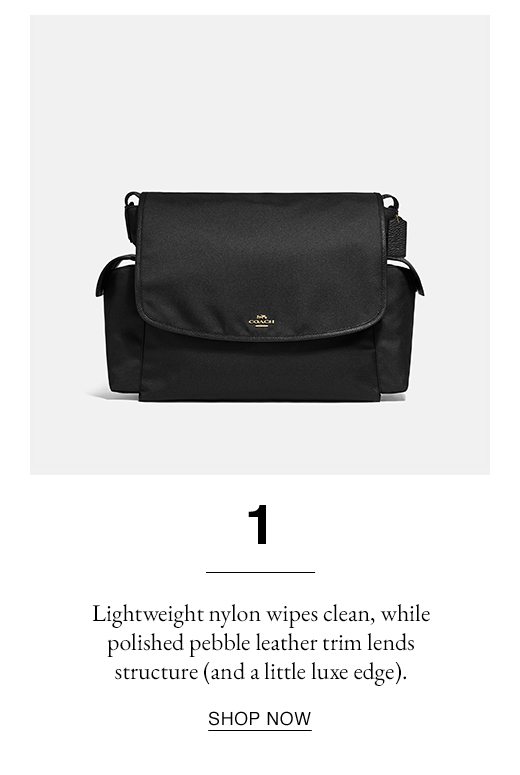 1 - Lightweight nylon wipes clean, while polished pebble leather trim lends structure (and a little luxe edge). SHOP NOW