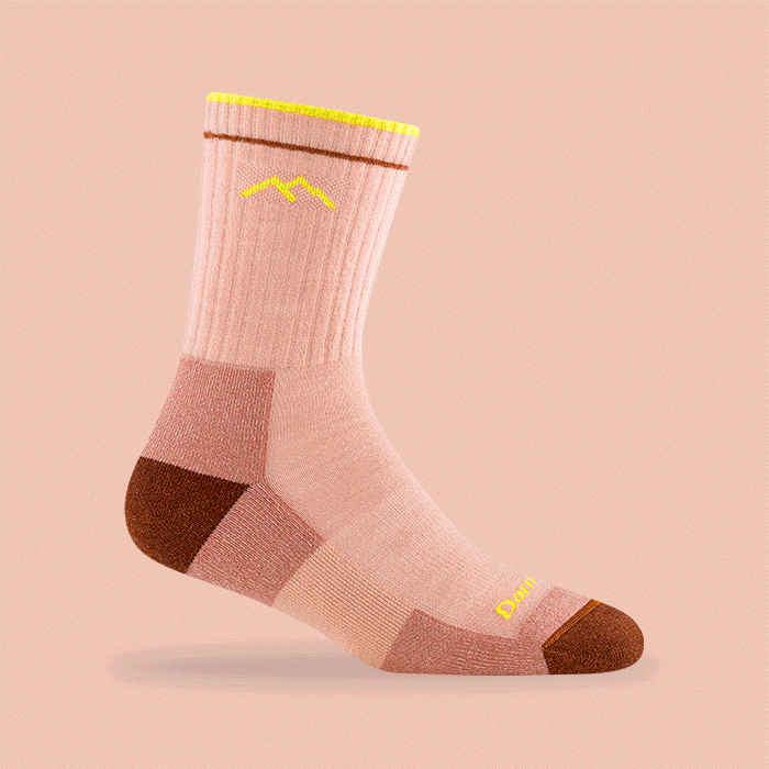 Shop Hidden Gems - a collection of Darn Tough hiking socks, in pink, blue and tan.