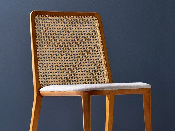 5 Designers Explain Why Cane Furniture is Trending