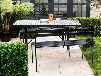 Rectangle mosaic table and black benches