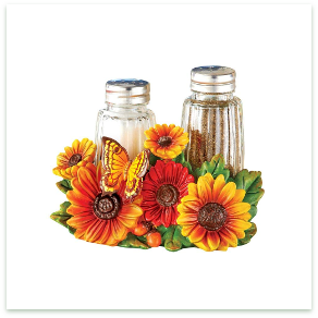 Functional and decorative, the holder includes two glass shakers.
