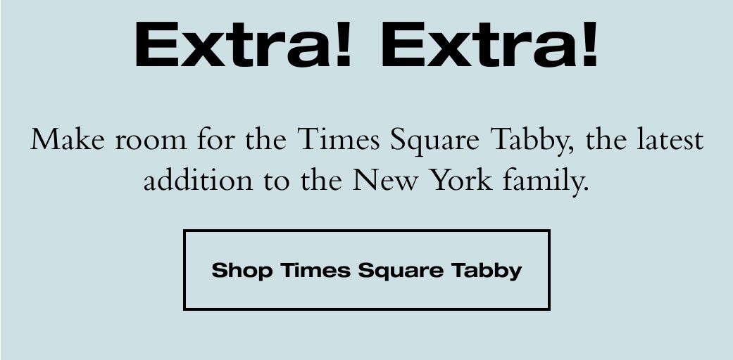 Extra! Extra! Make room for the Times Square Tabby, the latest addition to the New York family. 