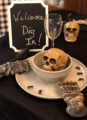 Creep it real with an easy-to-create centerpiece. | Guests will be impressed with this haunting look. | Learn More