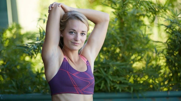 female runner wearing a sports bra